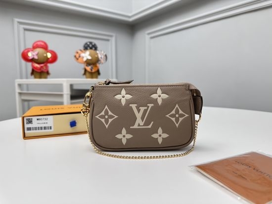 Louis Vuitton LV Mini Pochette Accessoires Monogram Empreinte Leather Handbag M80732