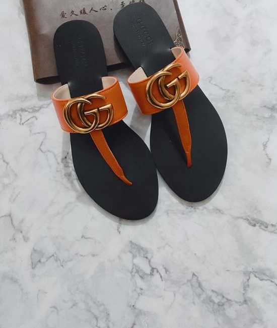 Gucci Cowhide Upper Flip Flops with Metal Decor
