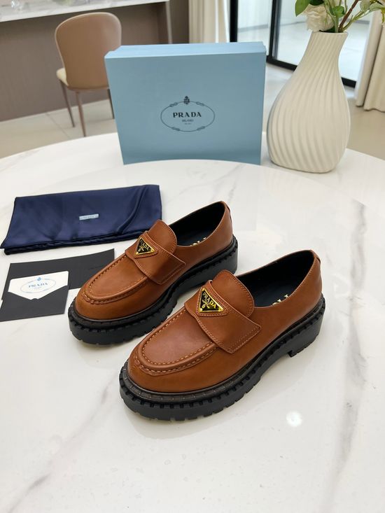 Prada Premium Leather Platform Loafers with Logo Accent