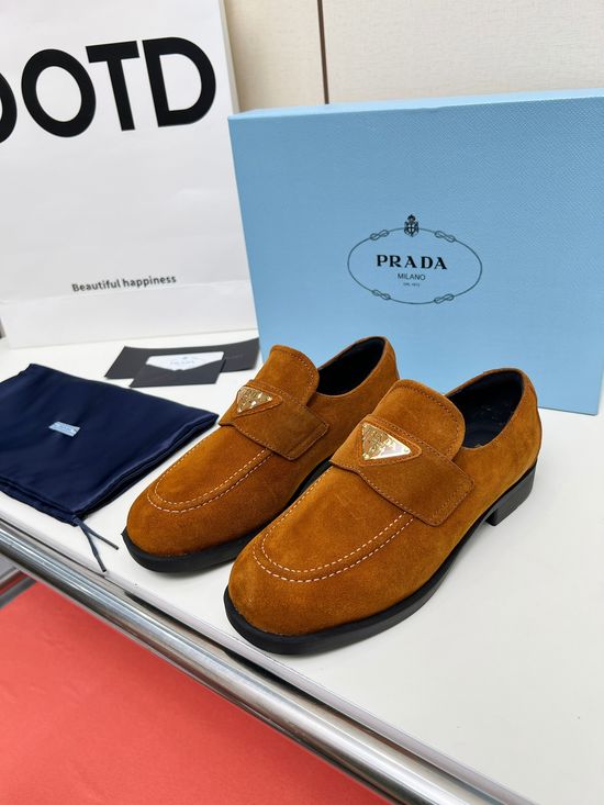 Prada Soft Leather Round Toe Loafers with Logo Buckle