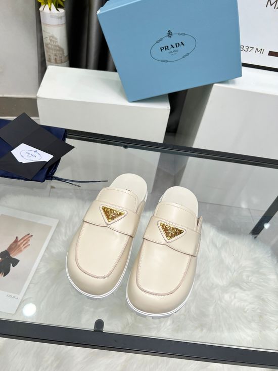 Prada Elegant Leather Casual Shoes with Embossed Logo Detail