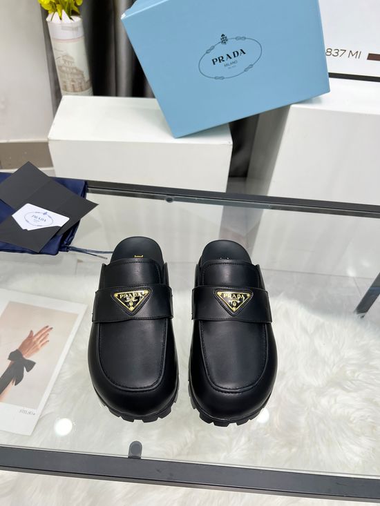 Prada Elegant Leather Casual Shoes with Embossed Logo Detail