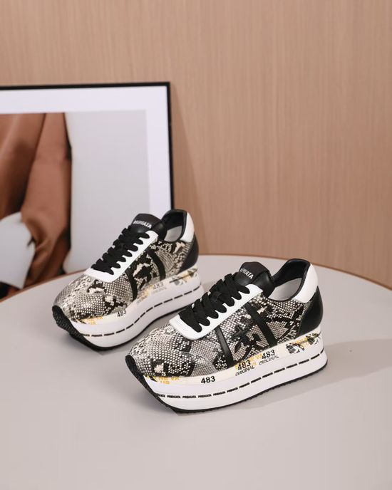 Premiata Minimalist White Casual Sneakers with Embossed Logo Detail