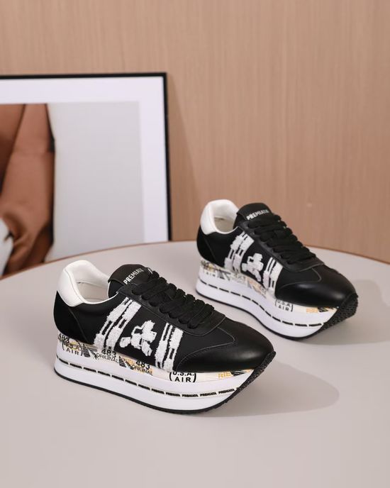 Premiata Minimalist White Casual Sneakers with Embossed Logo Detail
