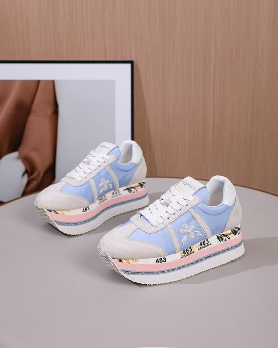 Premiata Minimalist White Casual Sneakers with Embossed Logo Detail