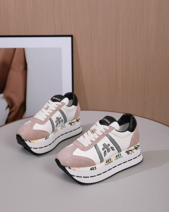 Premiata Minimalist White Casual Sneakers with Embossed Logo Detail