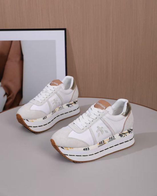 Premiata Minimalist White Casual Sneakers with Embossed Logo Detail
