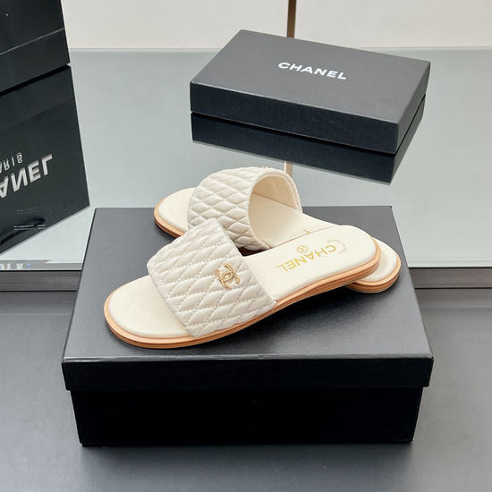 Chanel Elegant Embroidered Slippers with Metal Logo Accents