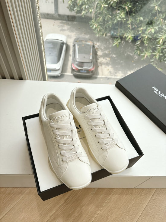 Prada Stitched Leather Casual Trainers With Logo Details