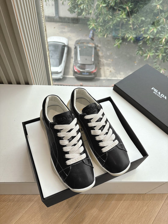 Prada Stitched Leather Casual Trainers With Logo Details