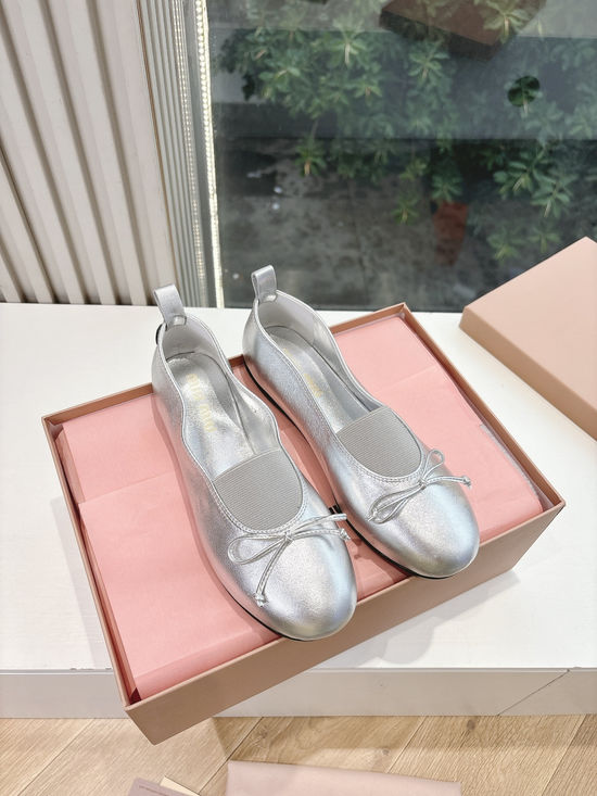 Miu Miu Lace-up Ballet Flats with Bow Detail