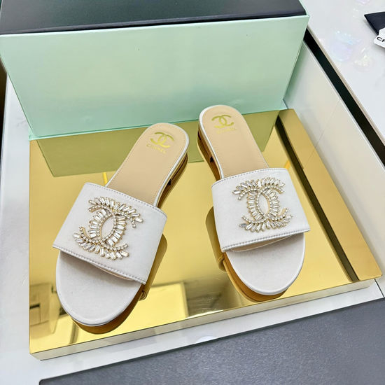 Chanel Classic Leather Slippers with Custom Logo Embellishment