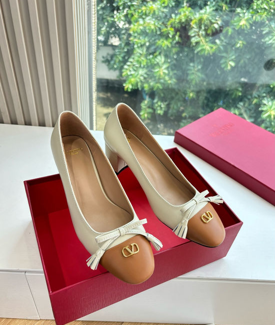 Valentino Elegant Slip-on Shoes with Smooth Lines and Height Boost