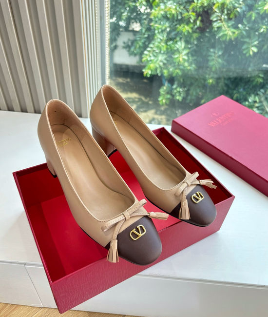 Valentino Elegant Slip-on Shoes with Smooth Lines and Height Boost