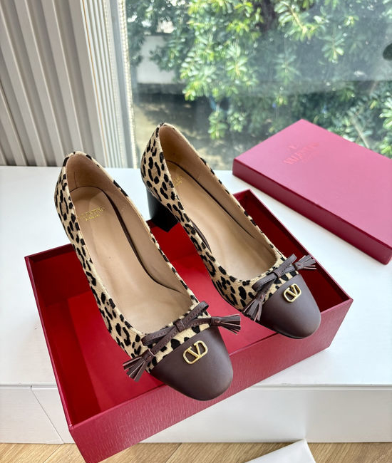 Valentino Elegant Slip-on Shoes with Smooth Lines and Height Boost