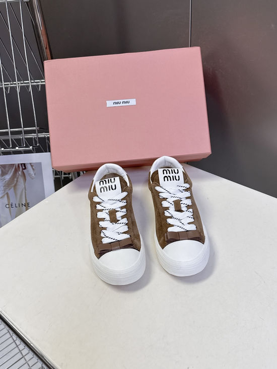 Miu Miu Bow Decorated Double Laces Vintage Leather Sneakers