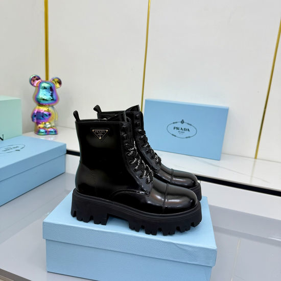 Prada Leather Biker Ankle Boots with Buckle and Rubber Sole