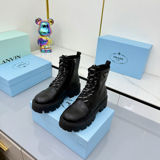 Prada Leather Biker Ankle Boots with Buckle and Rubber Sole
