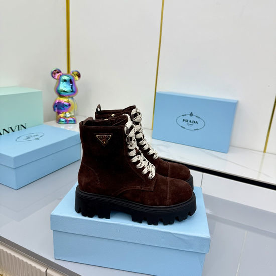 Prada Leather Biker Ankle Boots with Buckle and Rubber Sole