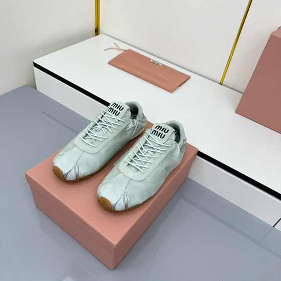 Miu Miu Retro Rope-Sole Boat Shoes for Modern Style