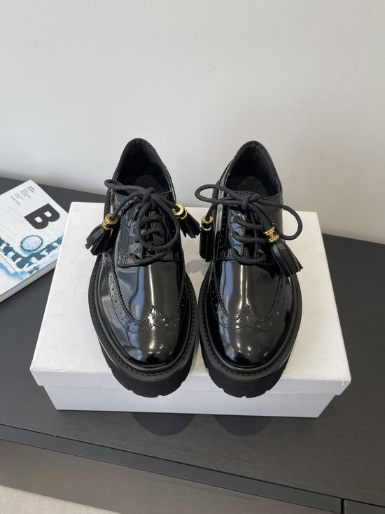 Celine Classic Loafers with Tassel Details for Versatile Style
