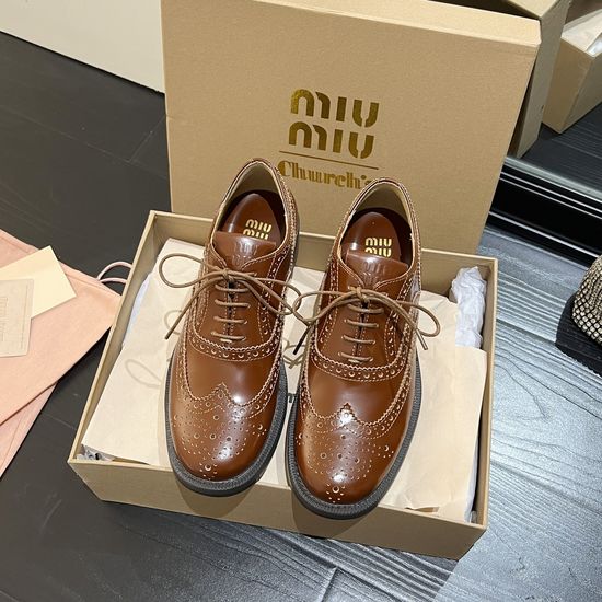 Miu Miu Stylish Lace-up Brogues with Classic Appeal