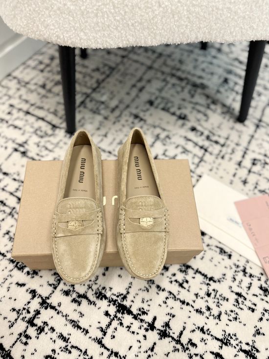 Miu Miu Charming Coin-Detail Loafers with Star Sole