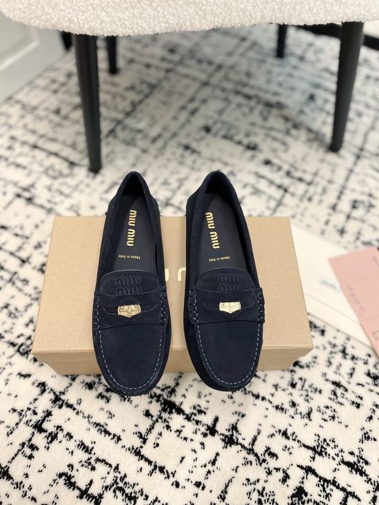 Miu Miu Charming Coin-Detail Loafers with Star Sole