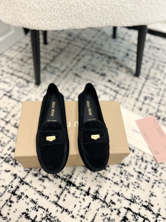 Miu Miu Charming Coin-Detail Loafers with Star Sole