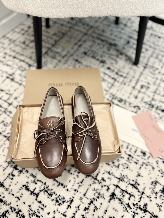Miu Miu Sophisticated Leather Loafers with Bow Detail