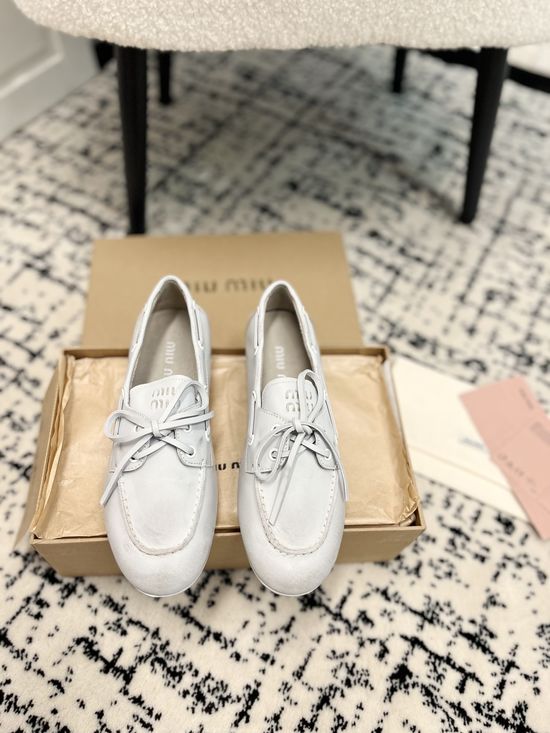 Miu Miu Sophisticated Leather Loafers with Bow Detail