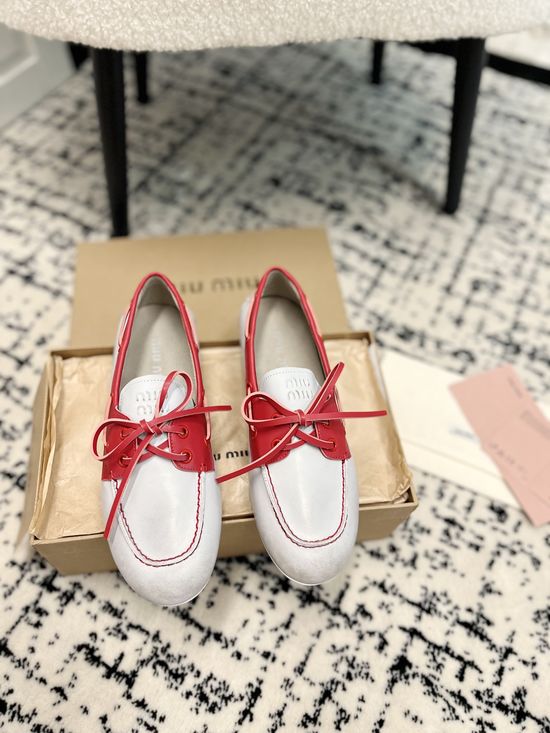 Miu Miu Sophisticated Leather Loafers with Bow Detail