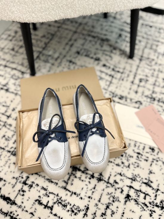 Miu Miu Sophisticated Leather Loafers with Bow Detail
