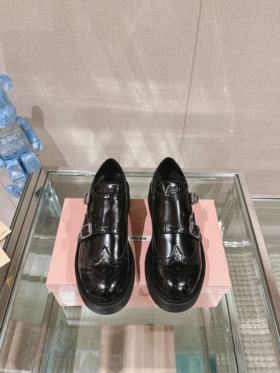 Miu Miu Thick Sole Leather Loafers With Double Buckle Design