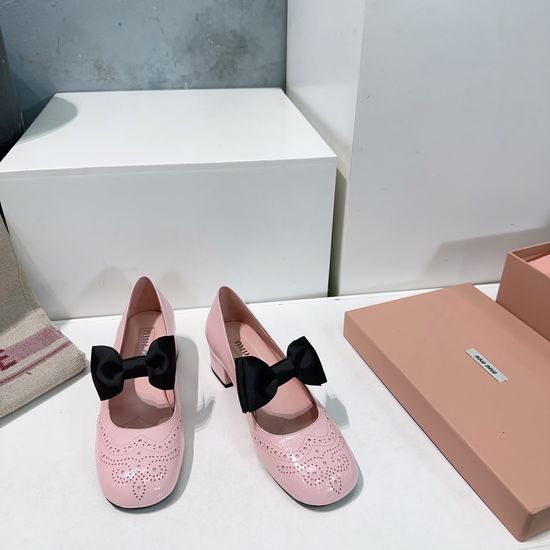 Miu Miu Patent Leather Mary Jane Shoes with Bow Detail