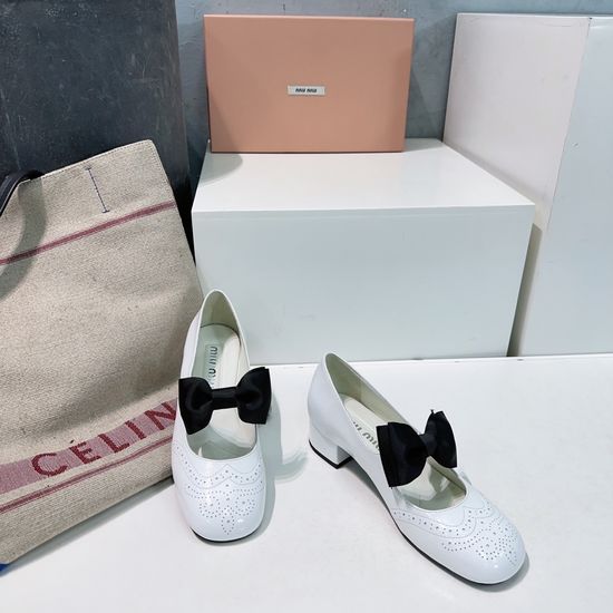 Miu Miu Patent Leather Mary Jane Shoes with Bow Detail