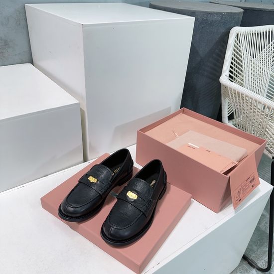 Miu Miu Vintage Distressed Leather Penny Loafers