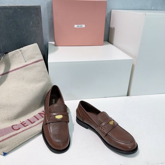 Miu Miu Vintage Distressed Leather Penny Loafers