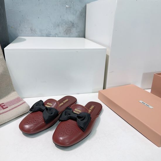 Miu Miu Bow Decor Perforated Leather Mule Loafers
