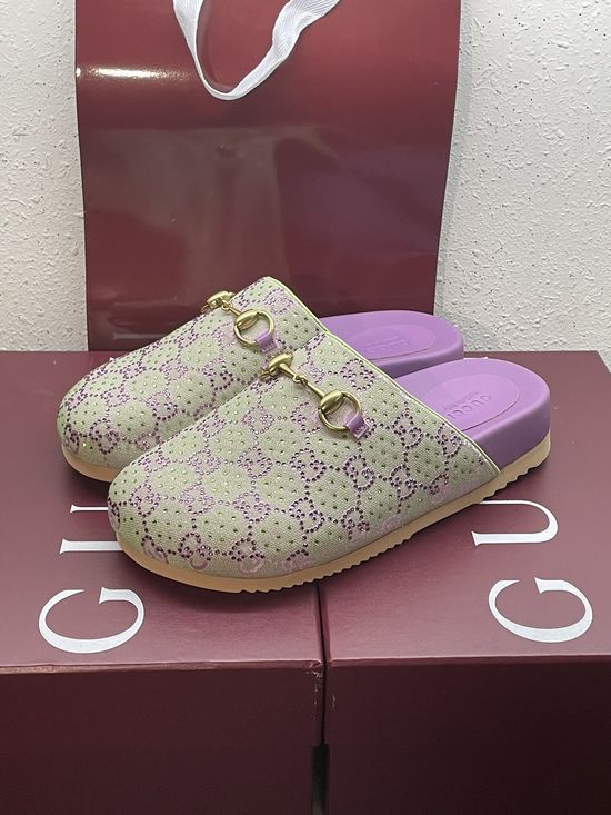 Gucci Luxury Slippers with Crystal Embellishments