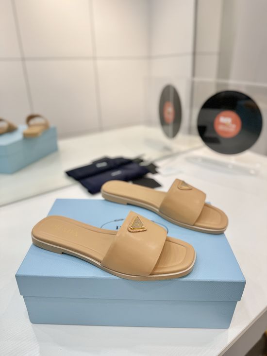 Prada Modern Geometric Heel Woven Slippers with Elegant Curves