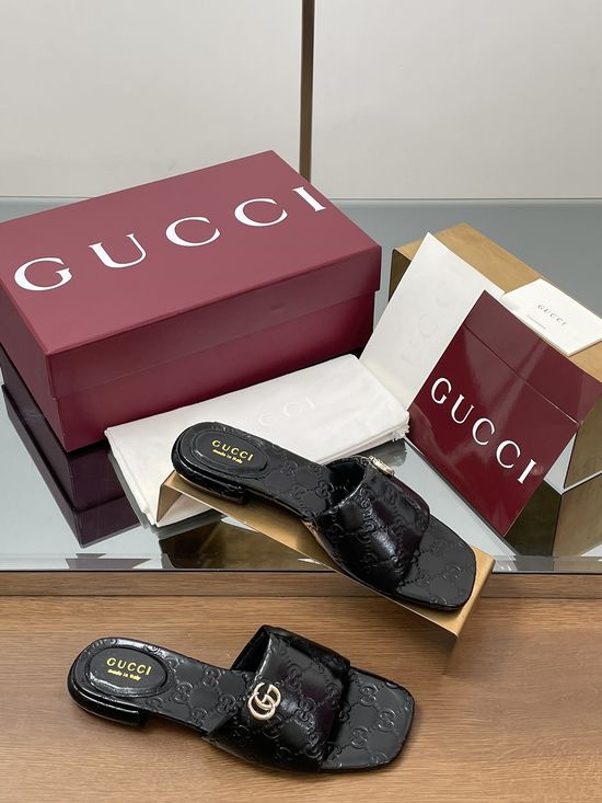 Gucci Soft Leather Embossed Slide Sandals with Metal Buckle