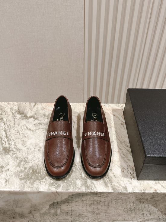 Chanel Premium Leather Loafers with Metal Logo Detail