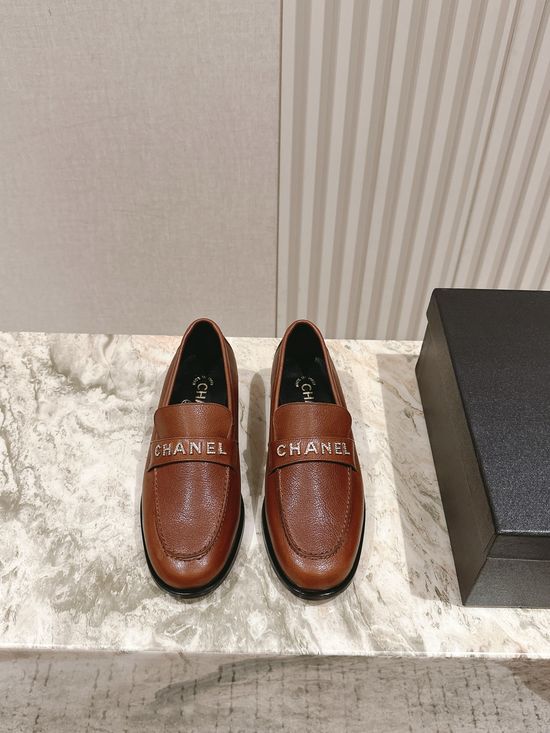 Chanel Premium Leather Loafers with Metal Logo Detail