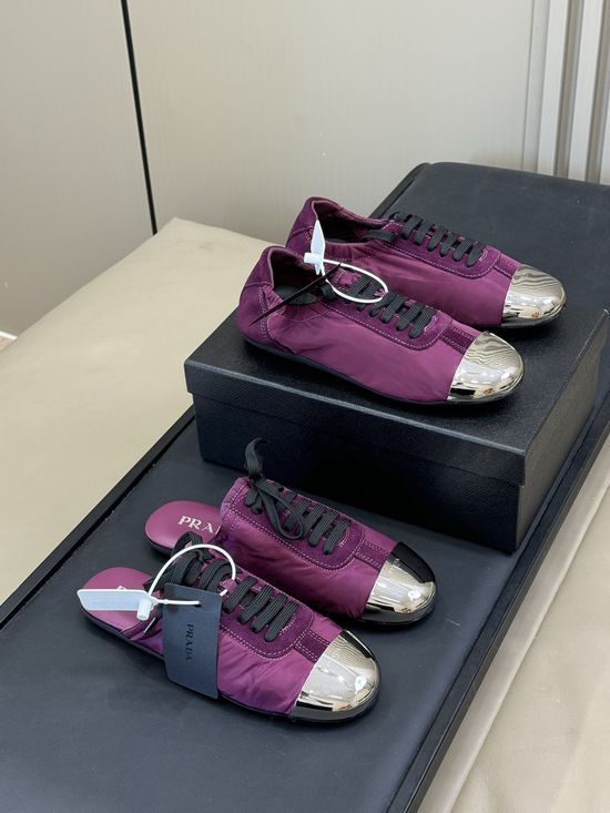 Prada Lightweight Low Top Sneakers with Metal Toe Cap