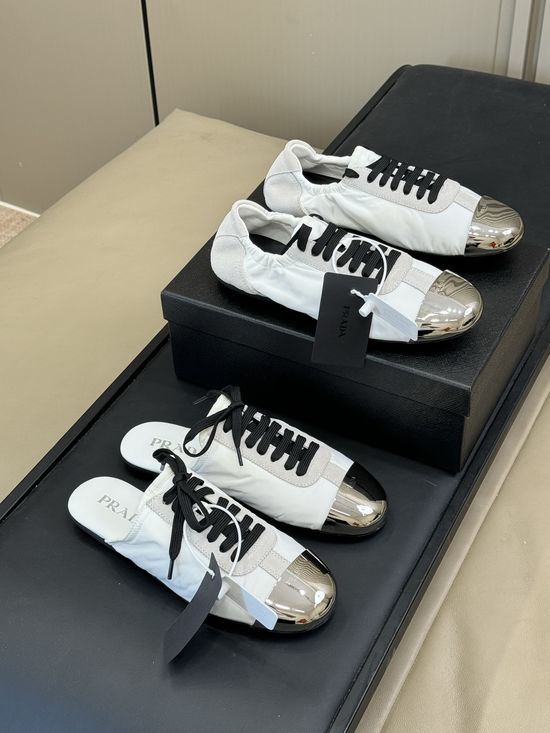 Prada Lightweight Low Top Sneakers with Metal Toe Cap