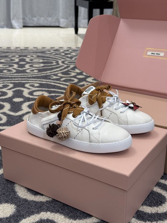 Miu Miu Cute Low Top Sneakers with Decorative Charm Details