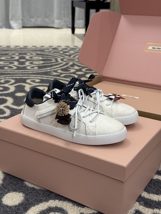 Miu Miu Cute Low Top Sneakers with Decorative Charm Details