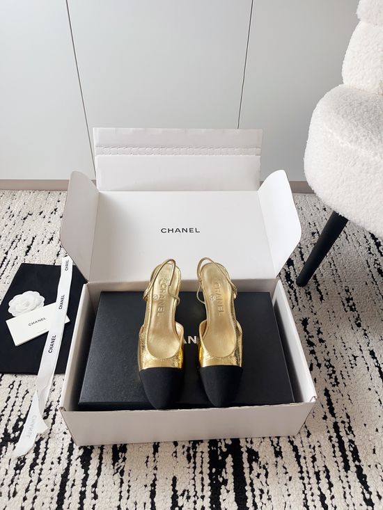 Chanel Elegant Hollow Pumps with Decorative Metal Buckle Leather Sole