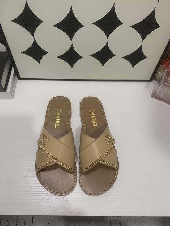 Chanel Genuine Leather Slip On Shoes with Metal Hardware